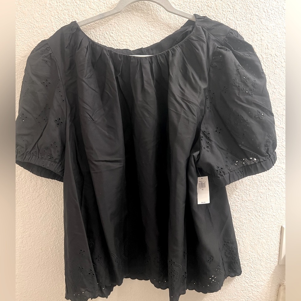 NWT old navy black with eyelet design on sleeves and bottom of shirt